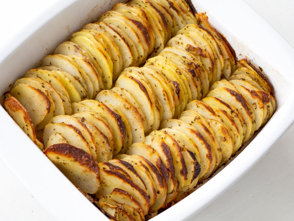 Bagte kartoffelskiver med parmesan og oregano