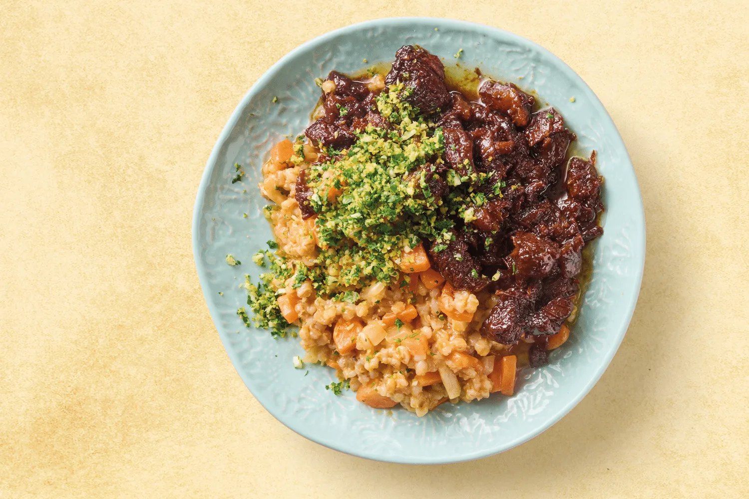 Honning og hvidvinsbraseret lam med bygotto og gremolata